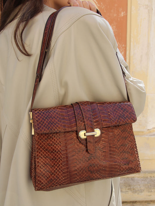 BORSA A MANO E TRACOLLA EFFETTO PITONE