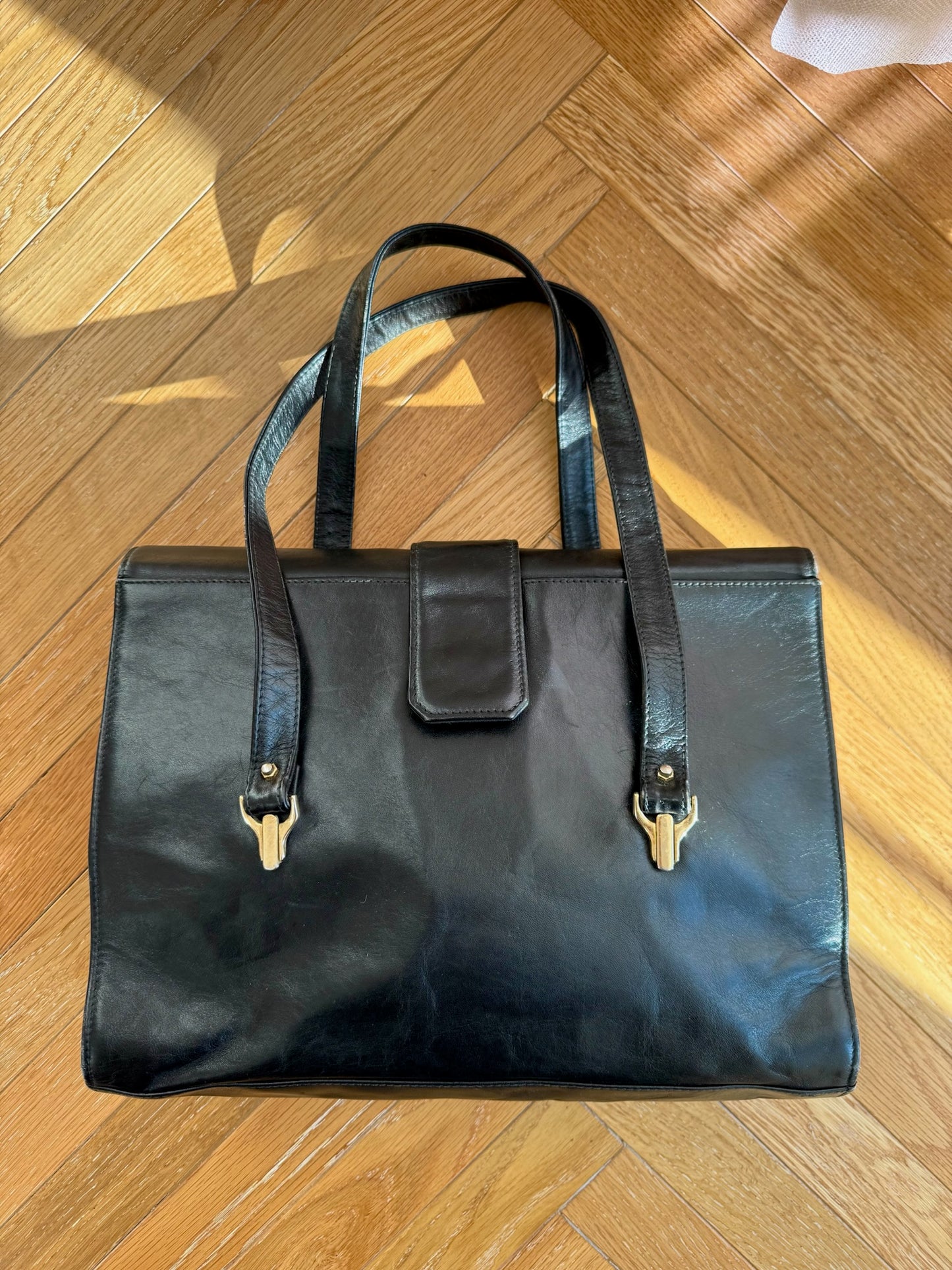 BORSA A MANO IN VERA PELLE NERA