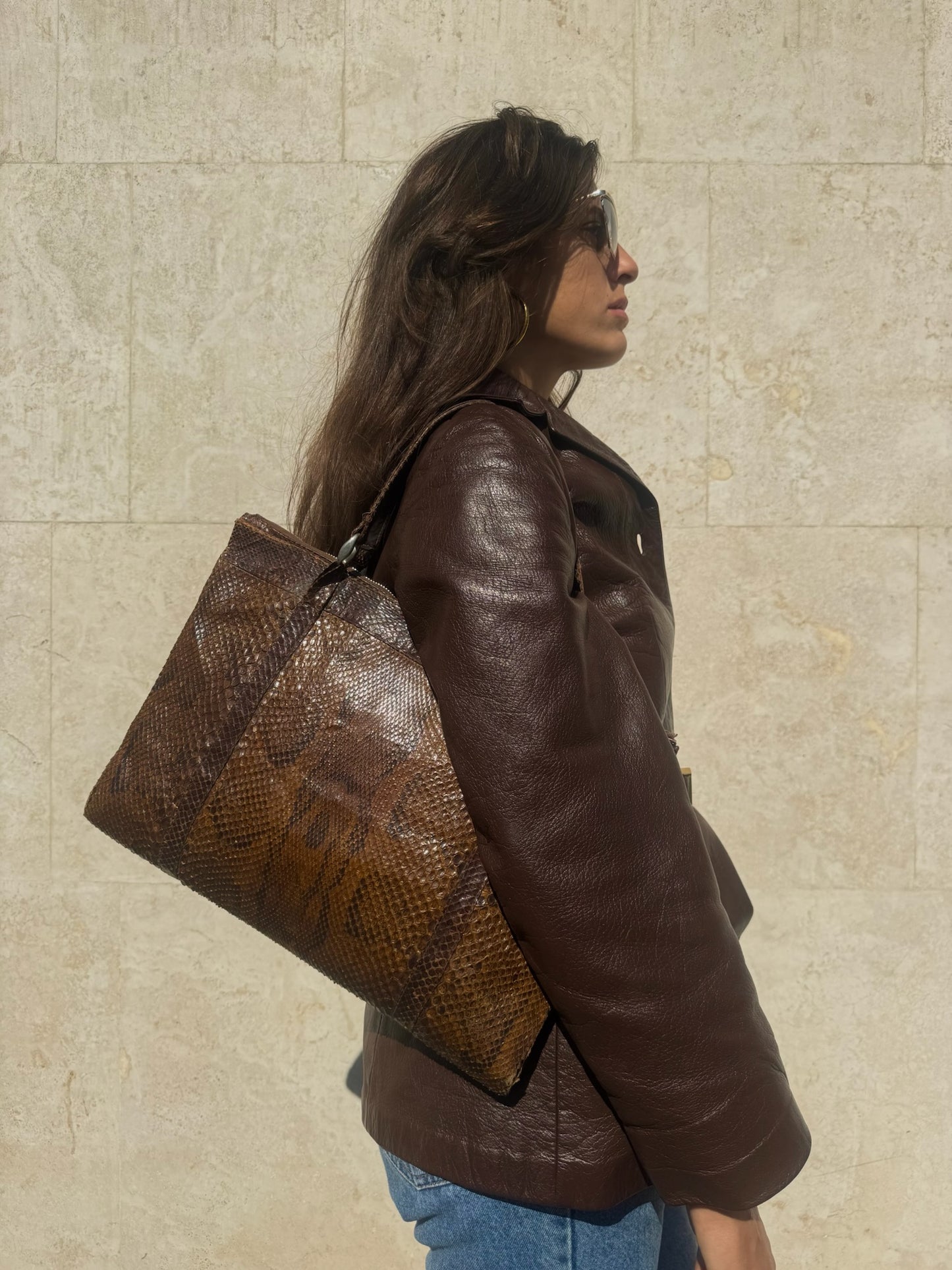 BORSA A MANO IN PELLE CON TEXTURE IN PITONE